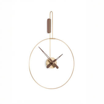 Distinguished Nomon Micro Daro wall clock with polished brass bezel and warm walnut wood hands in satin gold tone