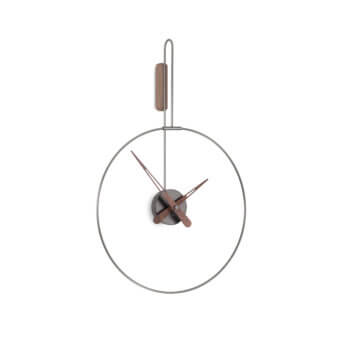 Elegant Nomon Micro Daro wall clock crafted with polished brass, warm walnut wood hands and muted silver-grey metal components