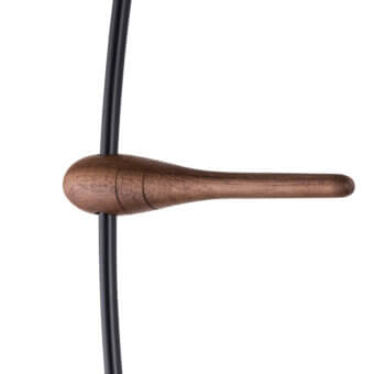 Distinguished Nomon Mini Bilbao wall clock with slender wooden arms and satin finish delivering balanced modern sophistication