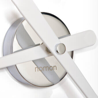 Elegant Nomon Rodón Mini L wall clock with a satin gray-white face and lacquered walnut hands