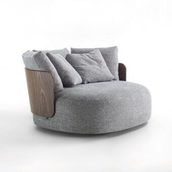 Exceptional lounge chair with textured gray textile upholstery and a satin finish curved medium-brown wooden frame