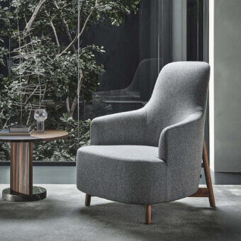 Lavish Porada Copine Bergere armchair upholstered in medium gray textile with satin-finish wooden legs