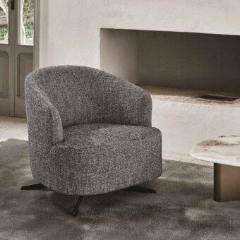 Sophisticated Porada Copine swiveling armchair in textured muted gray textile with sleek black metal base