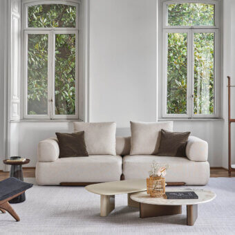 Exceptional Porada Klem sofa built with a solid canaletto walnut frame and light beige textile upholstery