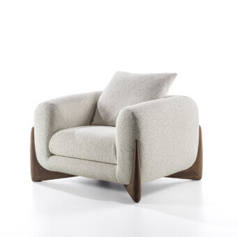 Harmonious Porada Softbay armchair with rounded silhouette, cotton bouclé upholstery and satin Canaletta walnut base