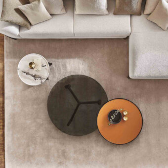 Elegant Porada Tillow coffee table with dark gray carved marble top and solid canaletto walnut base crafted with a smooth finish