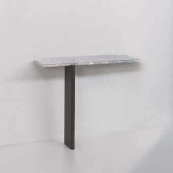 Superior Potocco E Claire console with a refined marble top and dark matte-finished metal base exhibiting subtle gray and pale pink veining