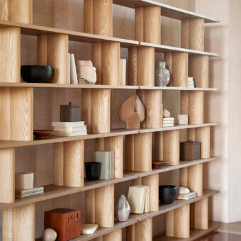 Superior Potocco Pages bookshelf in sinuous solid ash wood with a satin finish offers balanced display