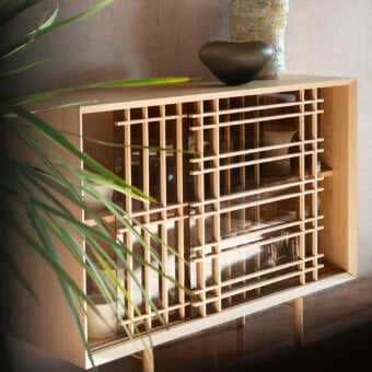 Elegant Potocco Sen cupboard crafted in Italy with solid ash, a satin finish and distinctive wooden grille detailing