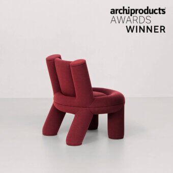 Superior Potocco Softy lounge chair with enveloping form in burgundy stretch fabric and matte finish