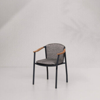 Sophisticated Potocco Solar armchair with speckled gray and white textile upholstery and powder-coated aluminum frame built with solid teak armrests