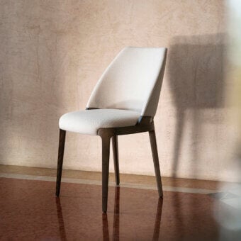 Elegant Potocco Velis Hug chair crafted in Italy with a satin-finished wood frame and textured neutral beige textile upholstery