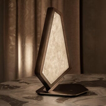 Distinguished Visionnaire Astralis table lamp with irregular polygonal design and warm dark brown wood frame, finished in brushed linear satin with onyx diffuser