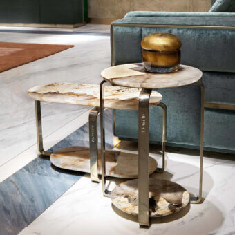 Distinguished Visionnaire Button coffee and side table with overlapping hand-polished beige and light brown marble tops and satin curved stainless steel base