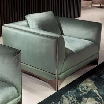 Captivating Visionnaire Ca’ Foscari lounge chair with plush grayish-green velvet upholstery and polished stainless steel base