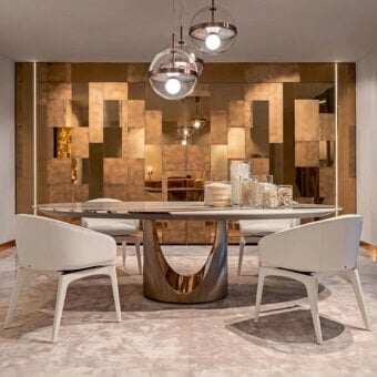 Captivating Visionnaire Cameron table with sculpted base in polished stainless steel and bronze-toned metallic marble elements, plus lacquered wooden under-top