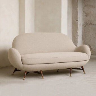 Distinctive Visionnaire Mercury sofa with neutral beige stretch fabric upholstery and matte black steel bases accented with brass tips