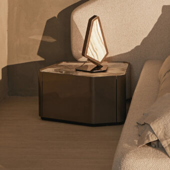 Distinguished Visionnaire Neolito nightstand with angled form and unique “leather”-finish marble top in warm brown metallic lacquer