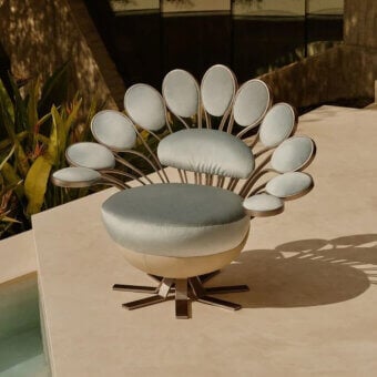Superior Visionnaire Pavone Outdoor lounge chair with painted metal frame and leather upholstery in pale blue-grey hues