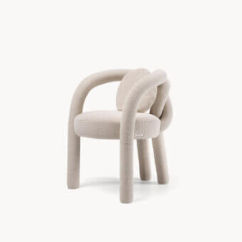 Distinguished Visionnaire Shibari chair with textured stretch fabric upholstery and curved tubular metal legs forming a knot detail