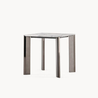 Elegant Visionnaire Vixen side table with polished marble top and angled base in dark grey stainless steel and textured aluminum finish