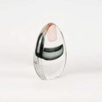 Exclusive Wave Murano Glass Flux sculpture with clear glass, sweeping black curves, and a reddish-orange grid in a frosted finish