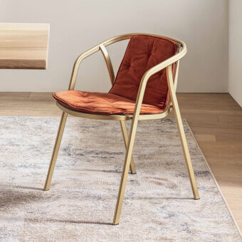 Superior Bontempi Ines chair with golden-toned metal and reddish-brown textile, crafted in Italy with looping arms and quilted seat detail
