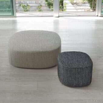 Impeccable CTS Salotti Brera ottoman crafted in light gray subtly textured fabric with a matte finish