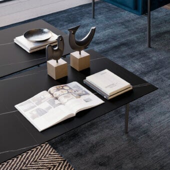 Exceptional Dallagnese Azimut coffee table crafted in dark-toned wood with a lighter wood veneer inset and matte black metal legs