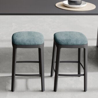 Distinguished Dallagnese Gulp stool with muted teal boucle upholstery and a matte dark-toned wooden structure