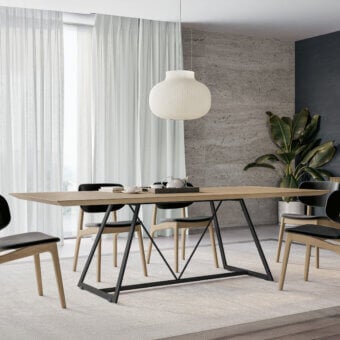 Distinguished Dallagnese Radar table with a light-toned wood tabletop and matte black metal frame exhibiting a satin finish