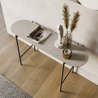 Refined Dallagnese Supernova console in light grey stoneware with sleek black metal rod support and matte finish