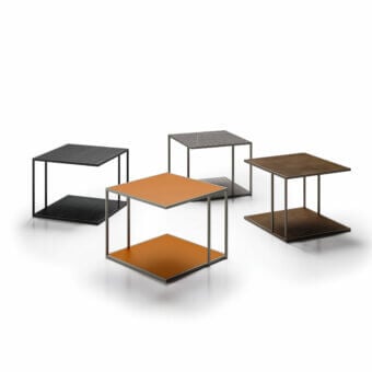 Distinctive Dallagnese Track side table with overlapping surfaces in orange wood and dark-toned metal frame