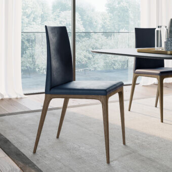 Distinguished Dallagnese Wendy chair with dark blue textile upholstery and a satin finish brown wood frame