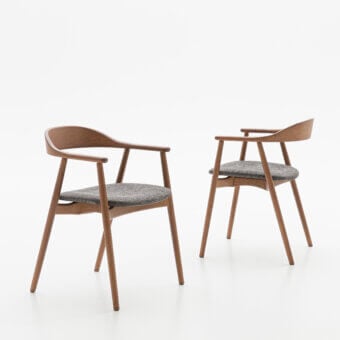 Distinguished Dallagnese Wolly chair with gently curved lines and textured grey weave upholstery in a satin-finished wood frame