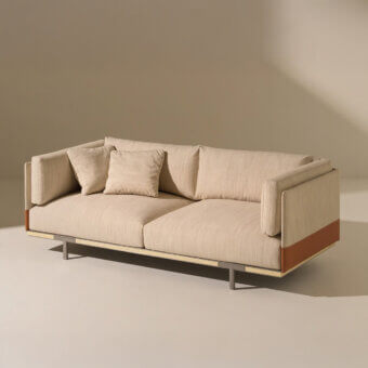 Refined Ethimo Baia sofa crafted in Italy with performance fabrics and a textured beige textile with reddish-brown wood accents