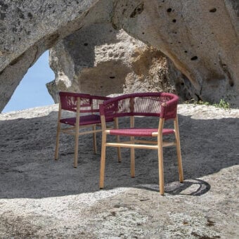 Exceptional Ethimo Kilt armchair with braided natural fiber and a smooth FSC-certified teak frame
