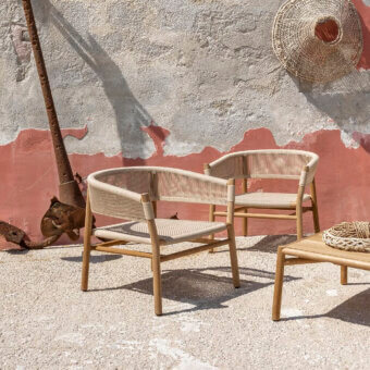 Exceptional Ethimo Kilt lounge chair crafted in FSC-certified teak with delicate natural fibre weave and light wood tone