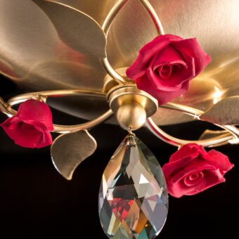 Superior Euroluce Bora Chandelier with satin gold finish, red Capodimonte porcelain roses and luminous handblown glass built with Swarovski pendant