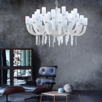 Elegant Euroluce Iceberg chandelier with textured glass and minimal silver-toned metal elements in Ice White