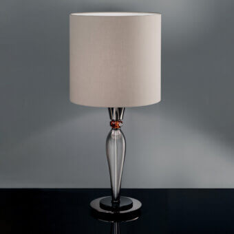 Exceptional Euroluce Olympia table lamp with fumé glass body, topaz crystal accent and light beige cylindrical lampshade in polished black nickel