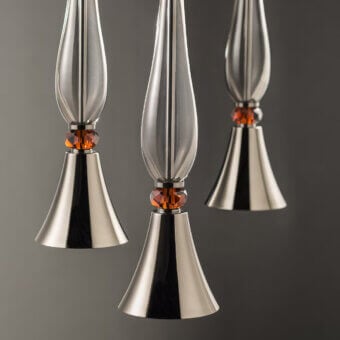 Elegant Euroluce Olympia S1 suspension lamp in glass and black nickel with luminous topaz-colored crystal accents crafted in Italy