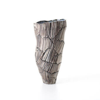Distinguished FOS Ceramiche Meltemi Rock vase crafted from pure white porcelain with a matte finish and grayish-brown textured ridges