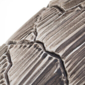 Superior FOS Ceramiche Meltemi Rock vase crafted in porcelain with mineral kintsugi and textured gray surface