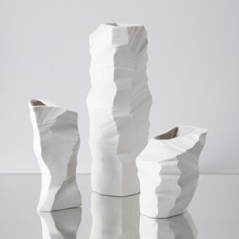 Exceptional FOS Ceramiche Artika vase set sculpted from precious porcelain with a bright white matte finish and fractured texture