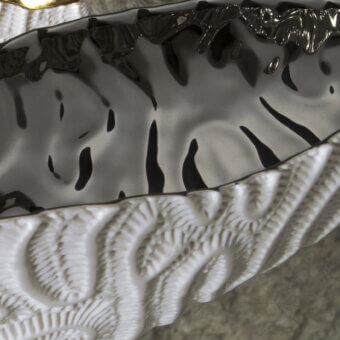 Distinguished FOS Ceramiche Coralreef centerpiece crafted from biscuit porcelain with a refined platinum interior and glossy black glaze
