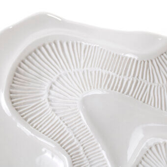 Distinguished FOS Ceramiche Opensea centerpiece crafted in white biscuit porcelain with a matte, subtly undulating surface