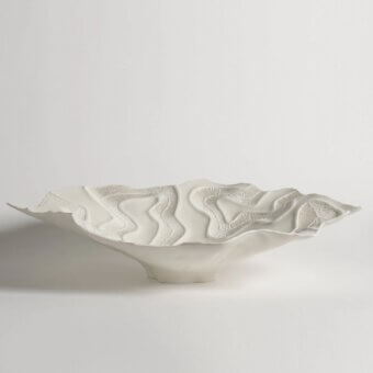 Distinguished FOS Ceramiche Opensea centerpiece crafted in off-white biscuit porcelain with a matte, textured surface
