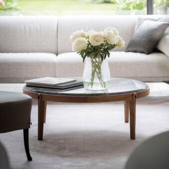 Superior Giorgetti Ago coffee table with round glass top and solid Canaletto walnut frame in satin finish