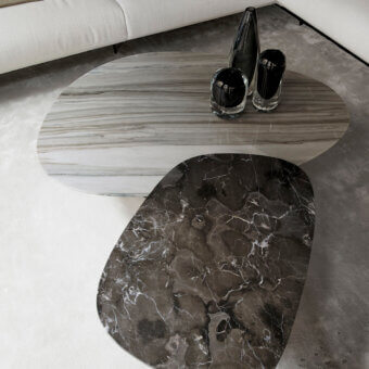 Exquisite Giorgetti Galet coffee table with overlapping grey and brown marble tops and high-gloss lacquer finish